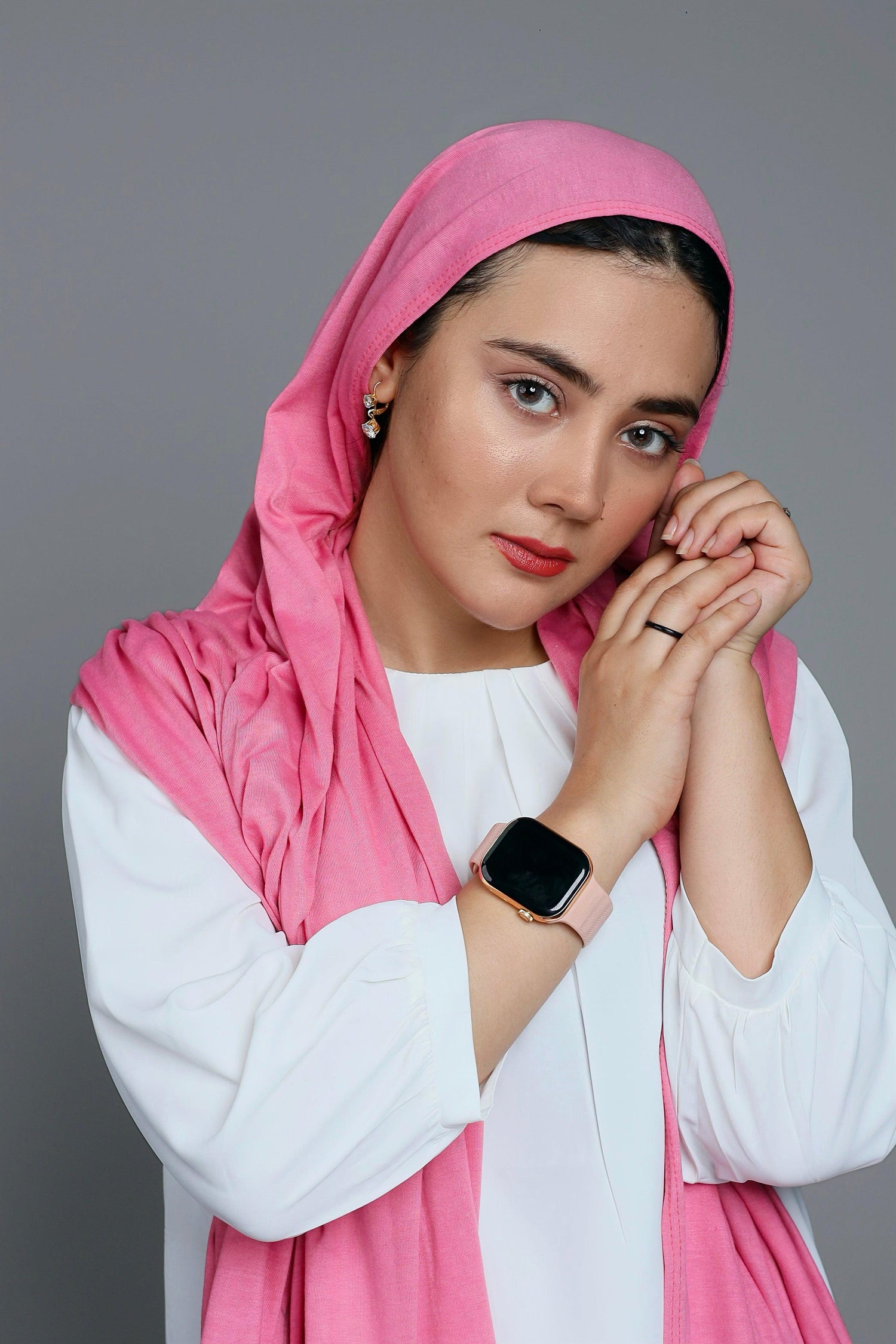 Chic Woman wearing cute Blossom Jersey Hijab Scarf looking her front.