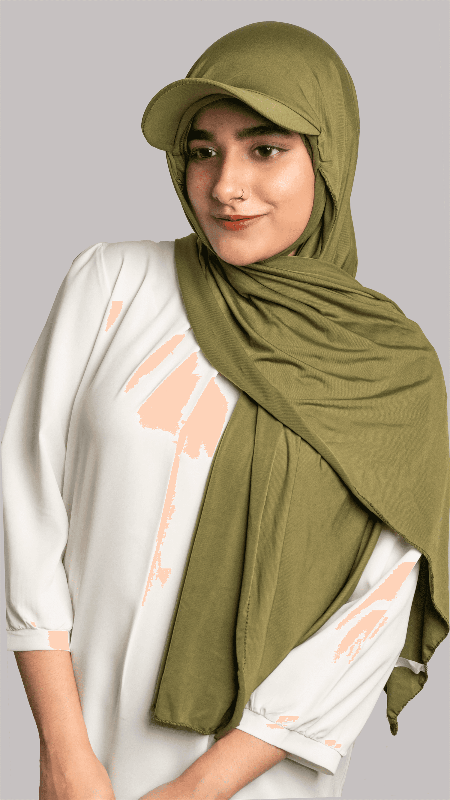 A woman wearing a stylish Hat Hijab in olive green on a white top.
