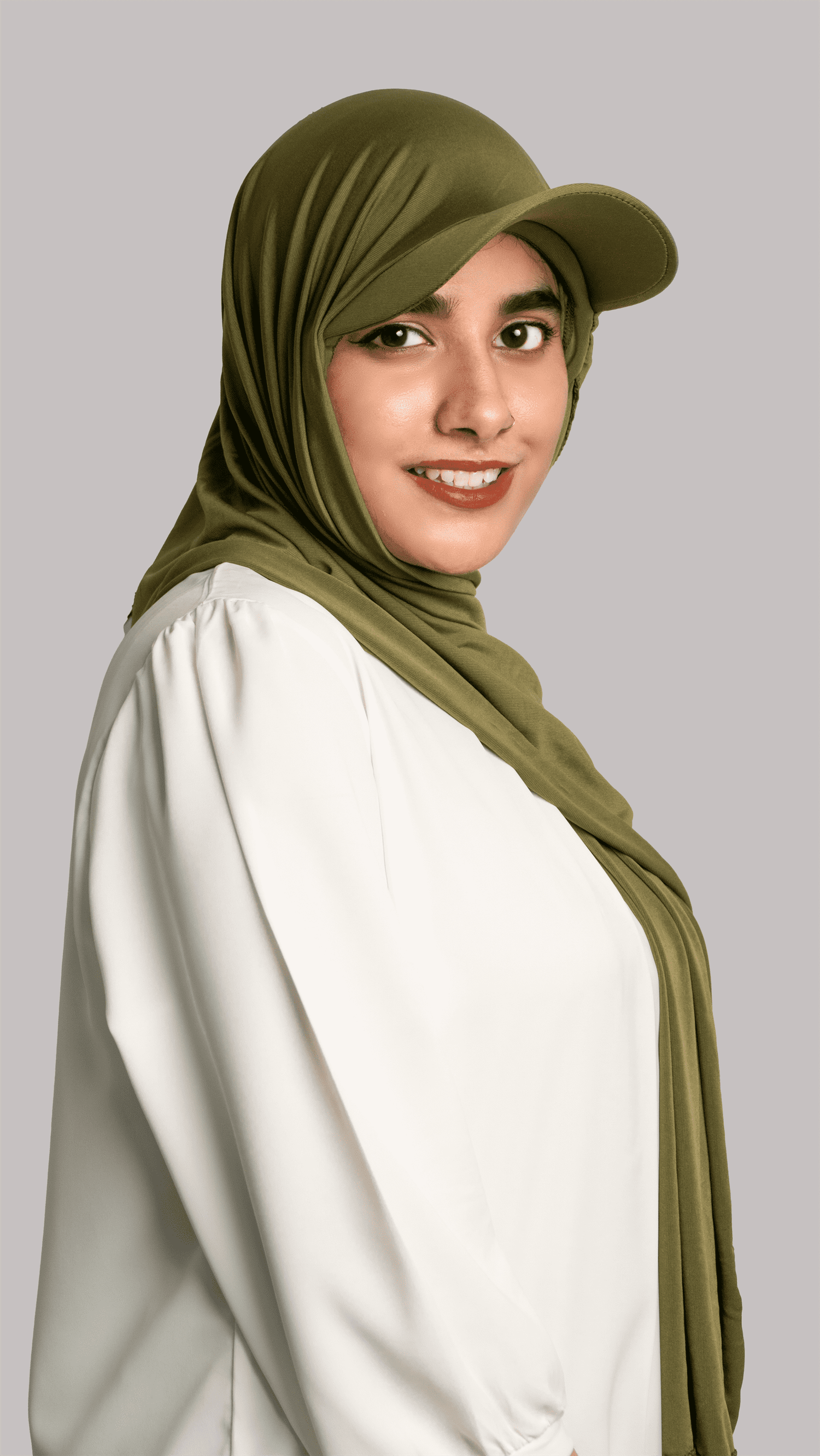 A women wearing a stylish Hat Hijab in olive green.