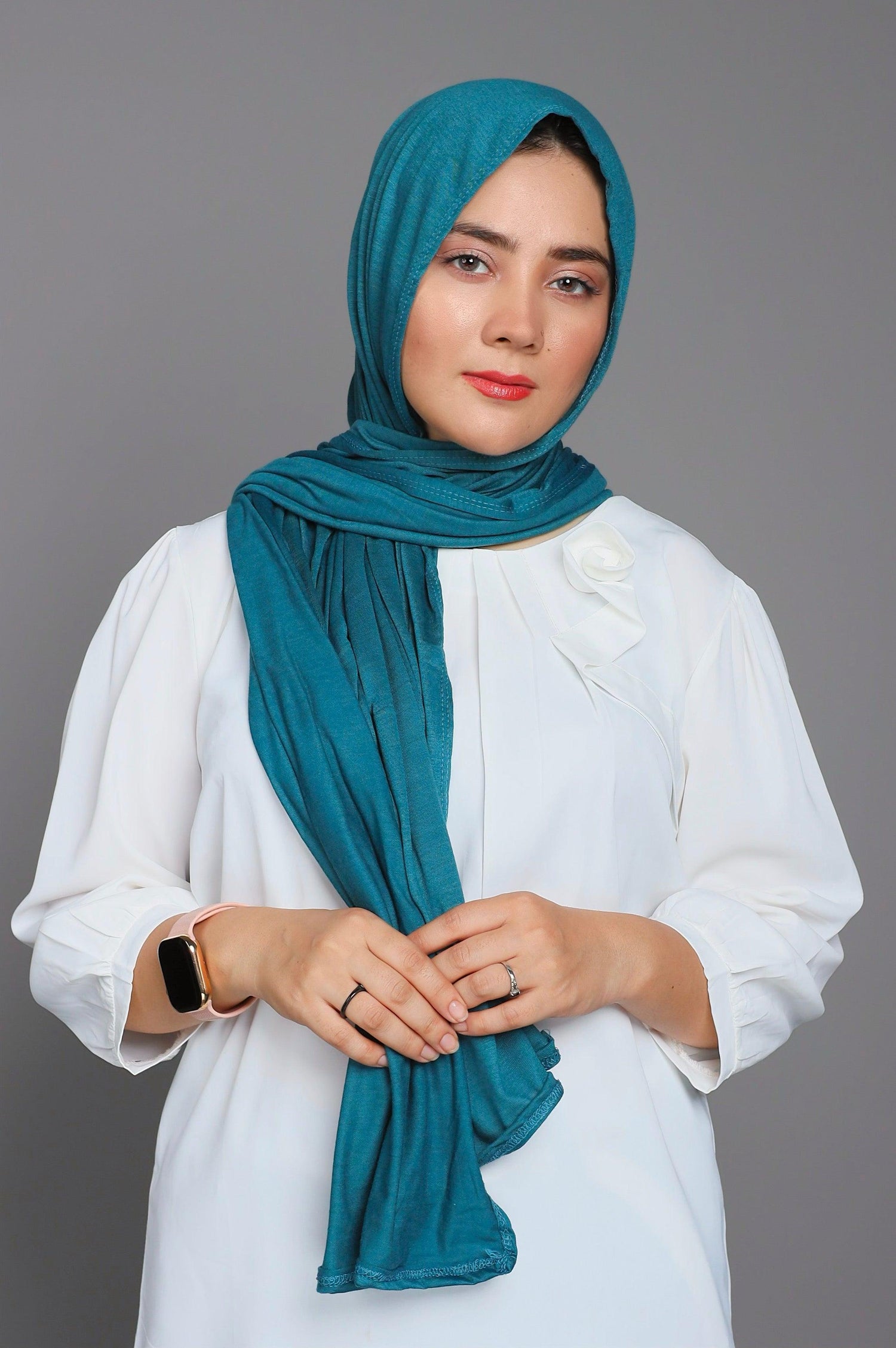 Scarves for ladies. woman wearing Jersey Hijab in Blue.