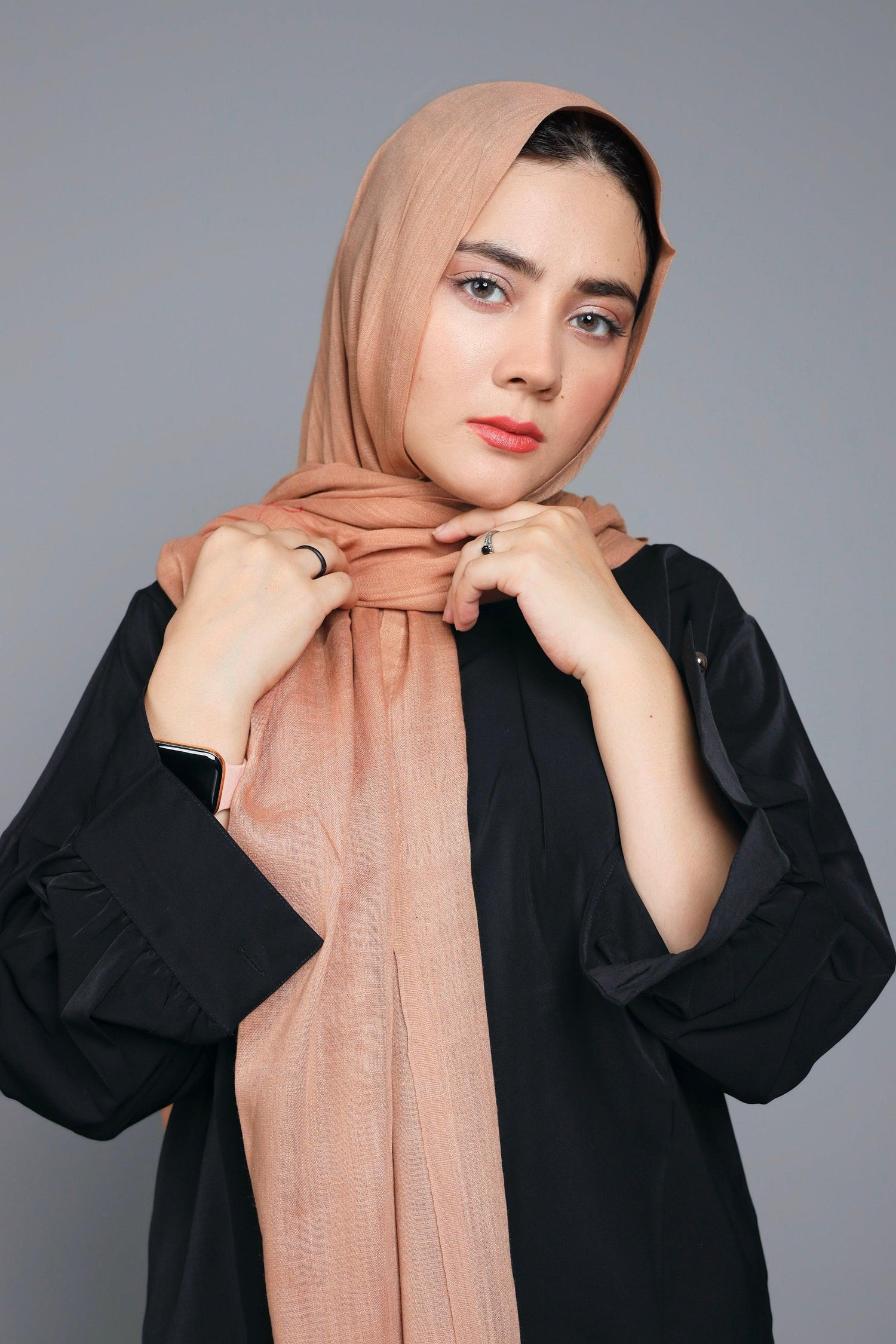 Turkish Scarf Hijab in Hazelnut, folded neatly to display its light to medium thickness.