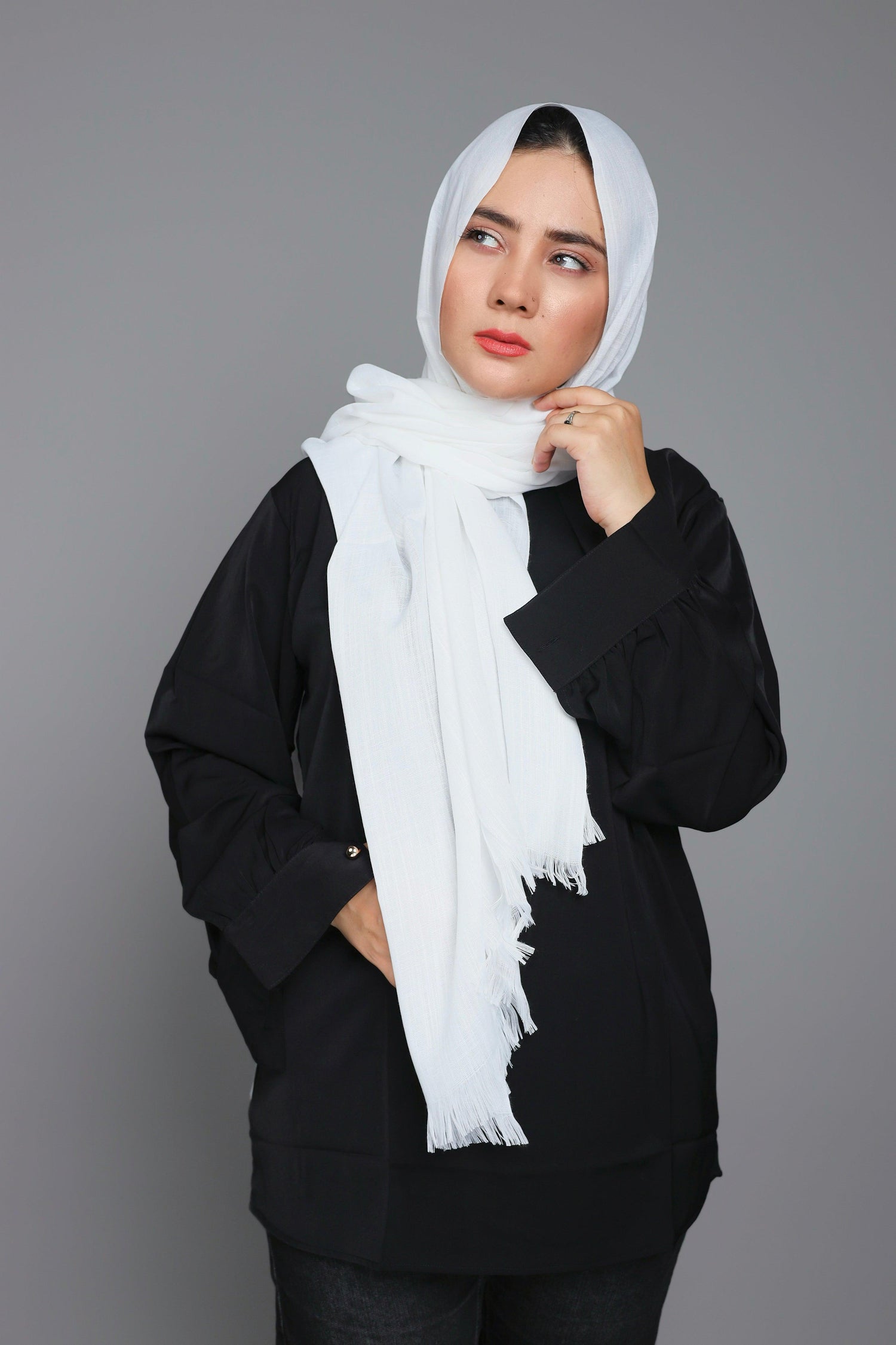 Model styling in Pure White Turkish Cotton Viscose Hijab, draped casually.