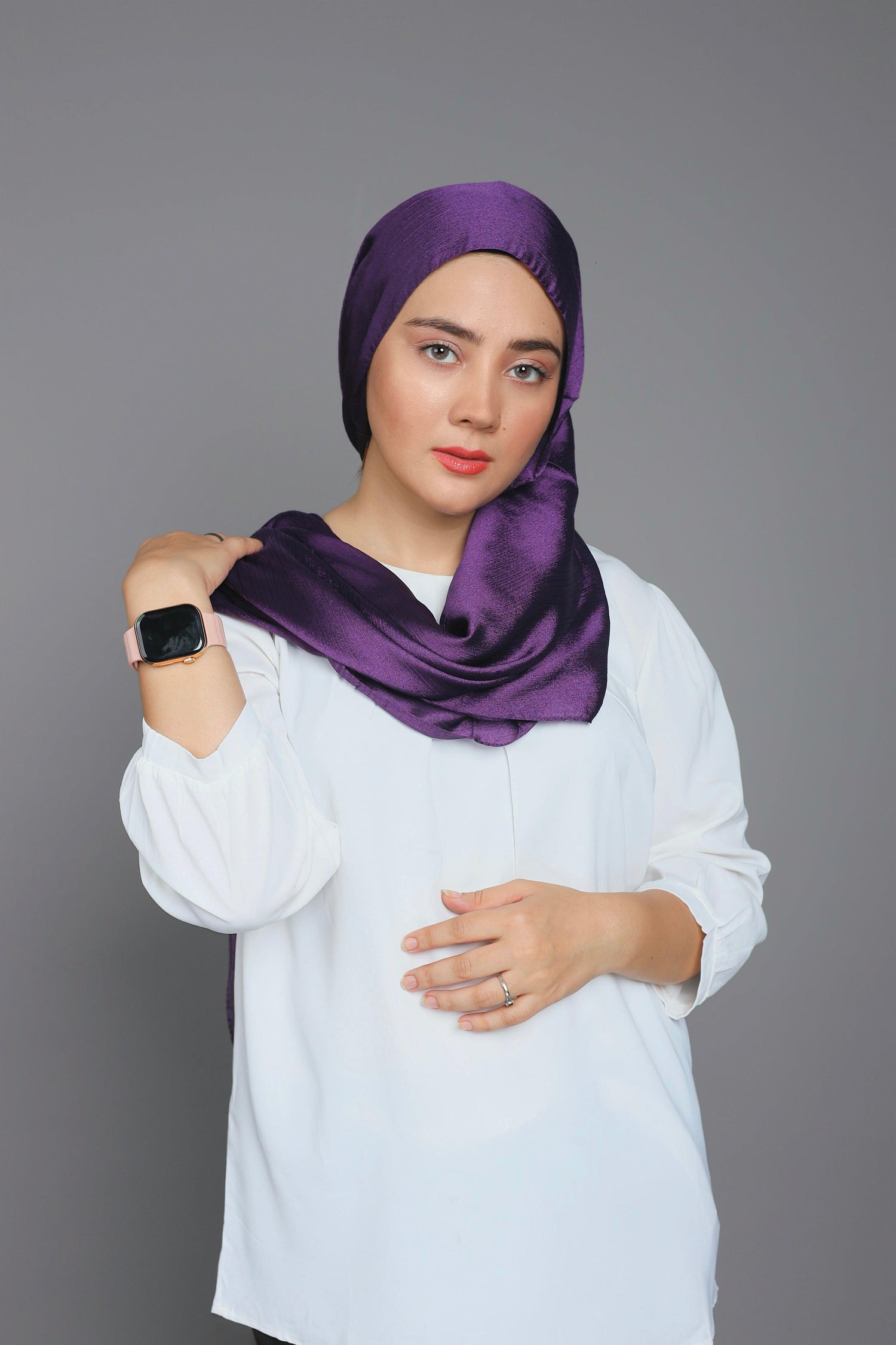 Metallic Chiffon Hijab in rich Dark Purple shade. Lady Styling it on Exquisite white top.