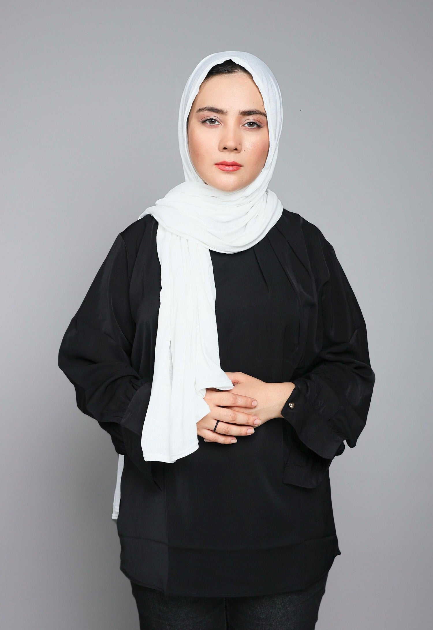 Woman wearing Jersey Hijab White.