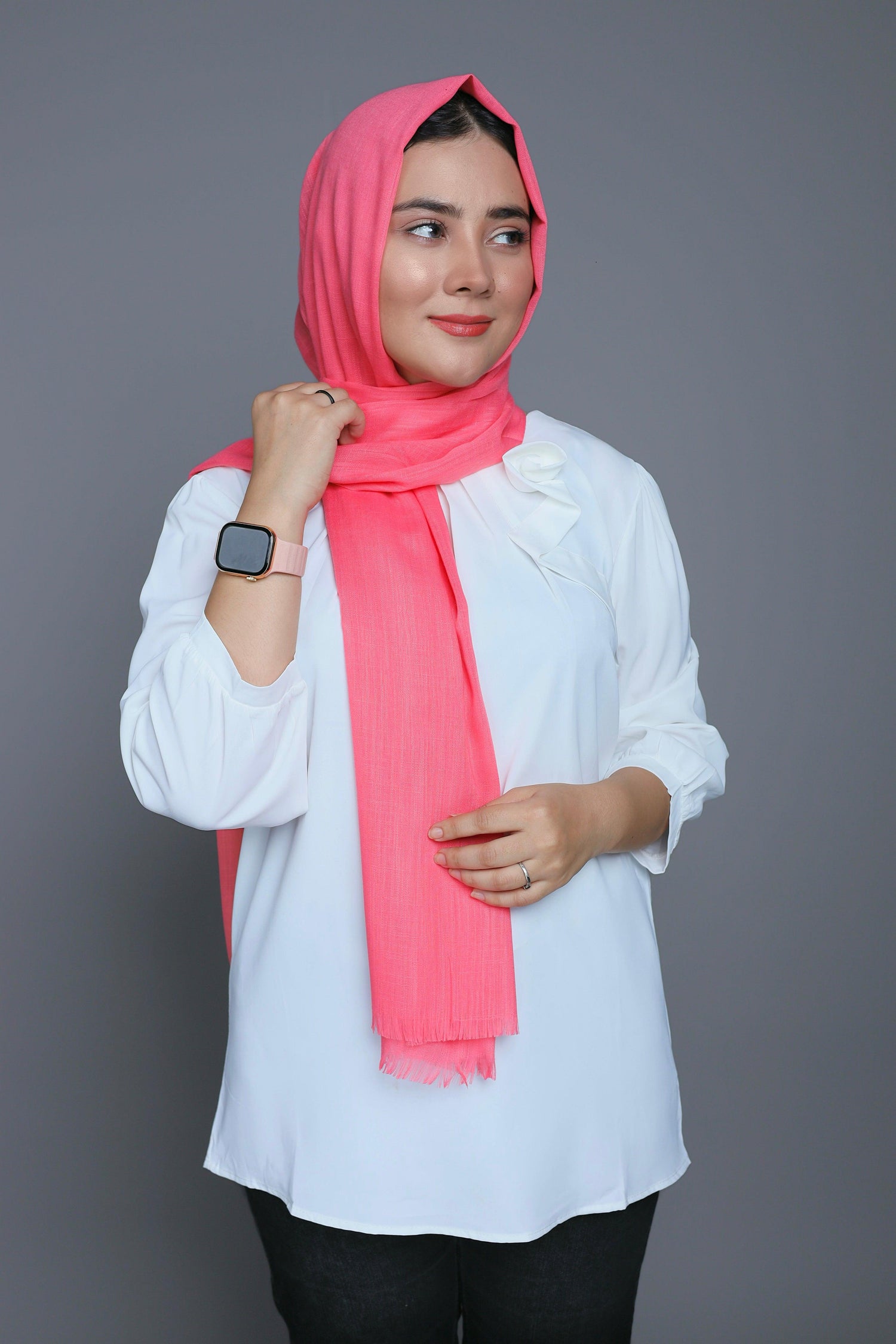 A woman wearing a soft Peach Quartz Turkish Hijab pakistan