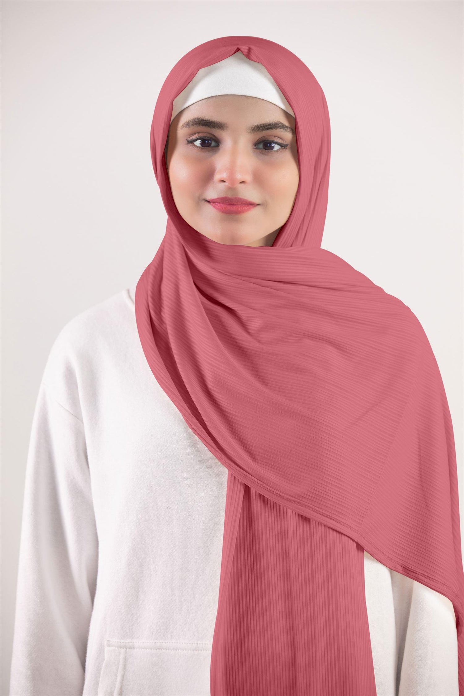 Ribbed Jersey Hijab in Blossom. Stylish Hijabi Wearing it for an elegant look. Premium Ribbd Jersey hijab.