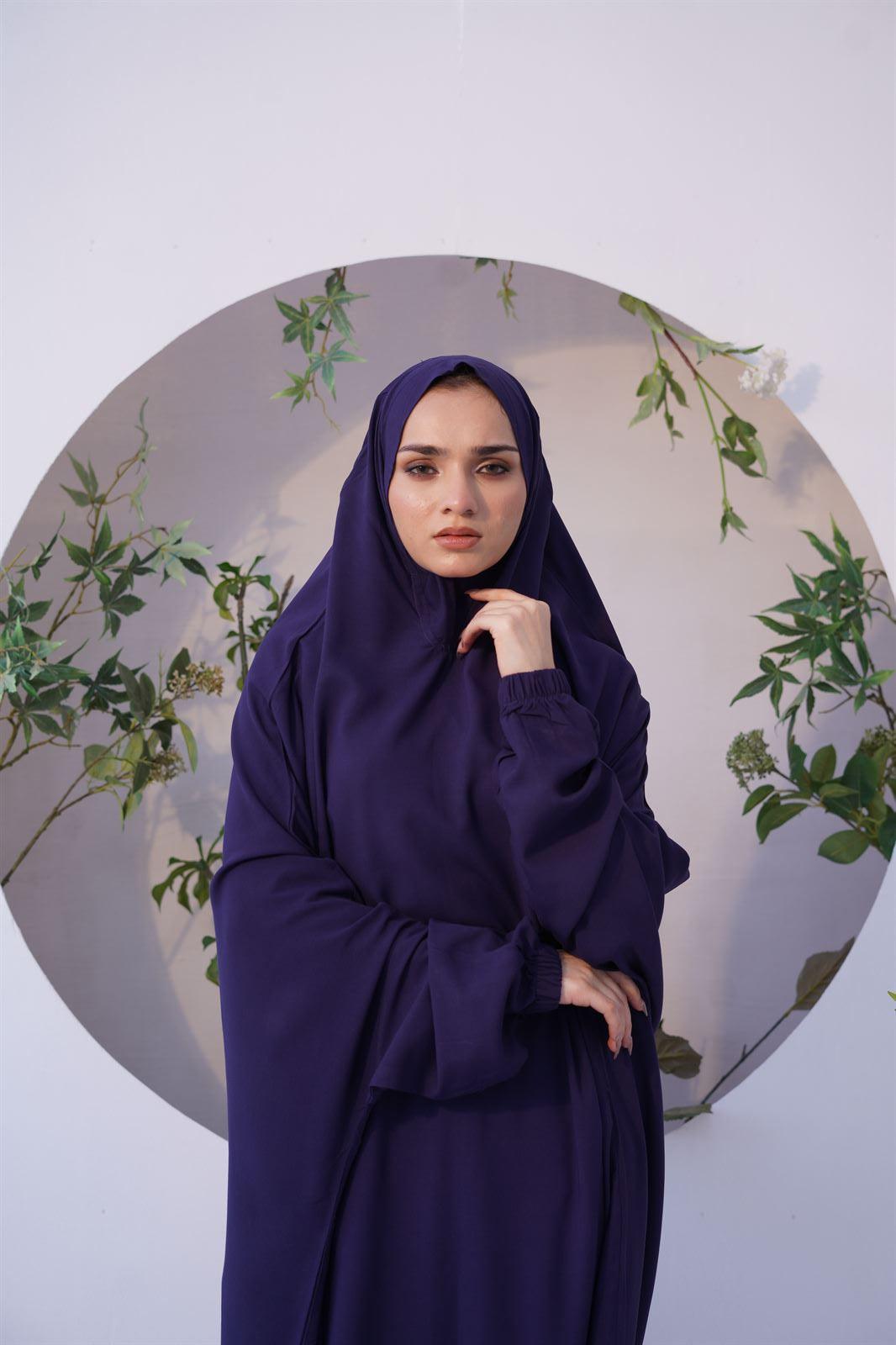 Girl wearing Namaz Chadar with sleeves. quality Prayer Dress in navy blue.