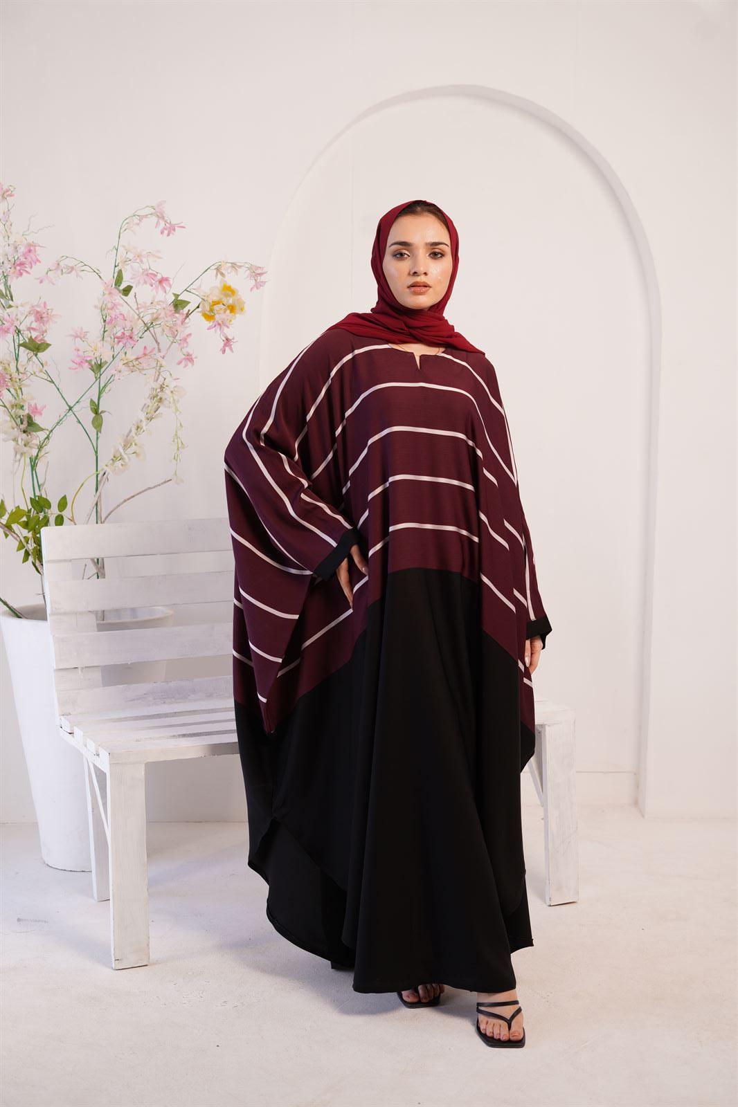 Jilbab abaya style. Girl wearing purple zoom line jilbab.