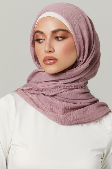 Girl wearing Soft crinkle hijab, viscose fabric material, front view.