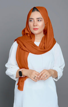 girl wearing Caramel Color Turkish Hijab. Premium Quality Cotton Viscose material. Soft Elegant & Chic Hijab.