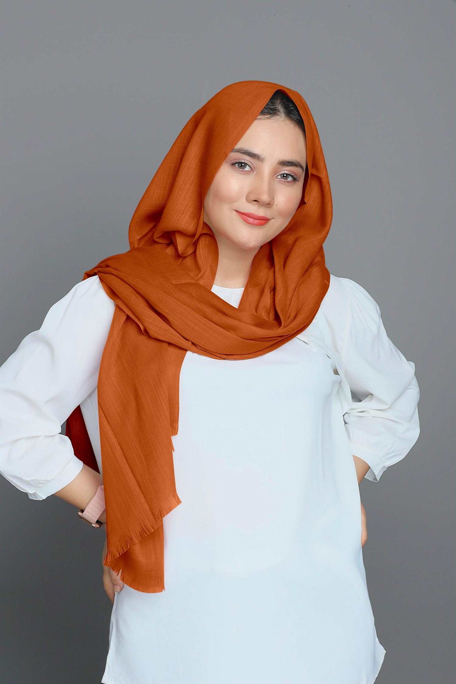 Stylish girl draped in a luxurious Caramel hijab, perfect for any occasion.