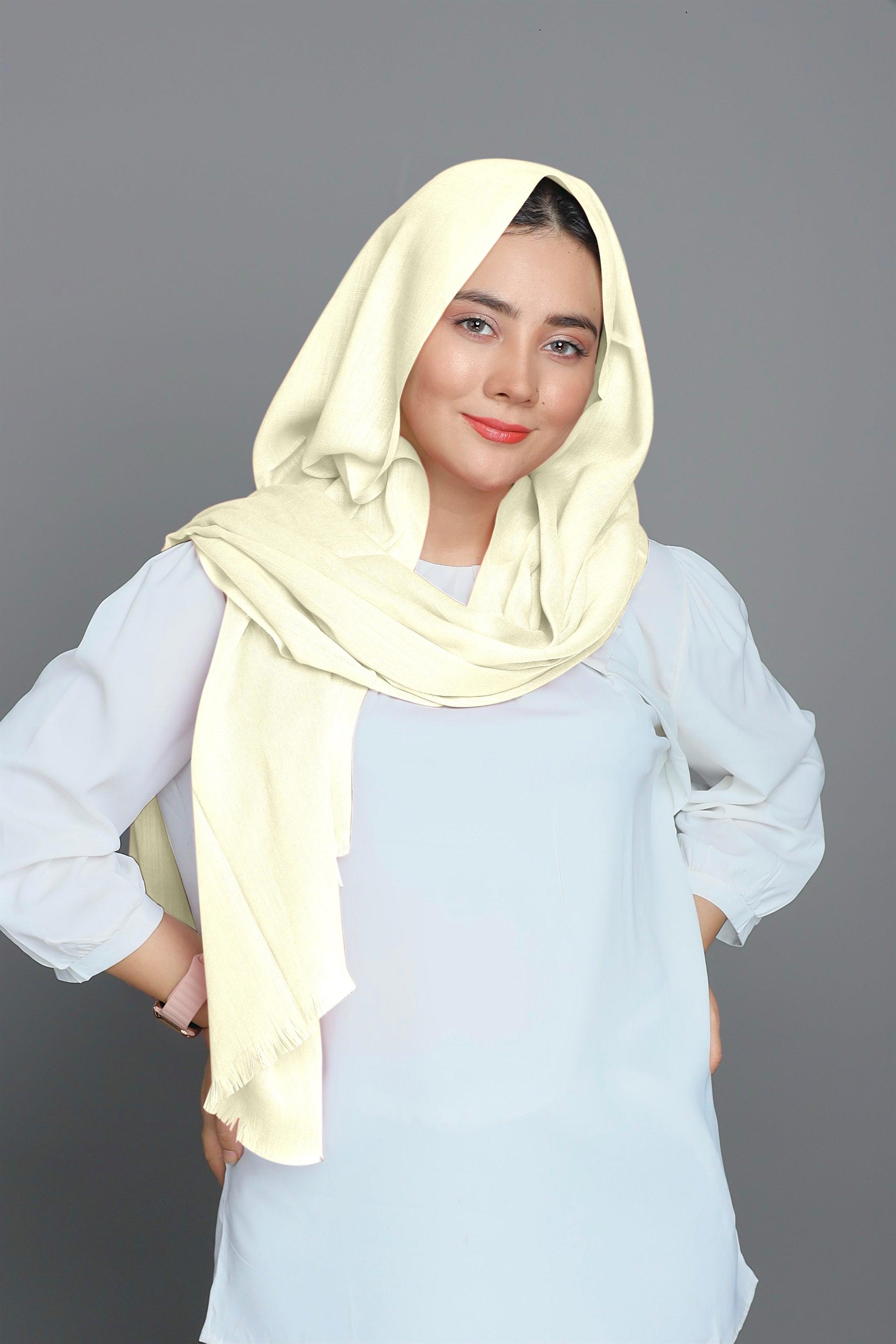 Charming hijabi styled in a delicate Vanilla Turkish Hijab, highlighting its versatility and lightweight Cotton Viscose fabric.