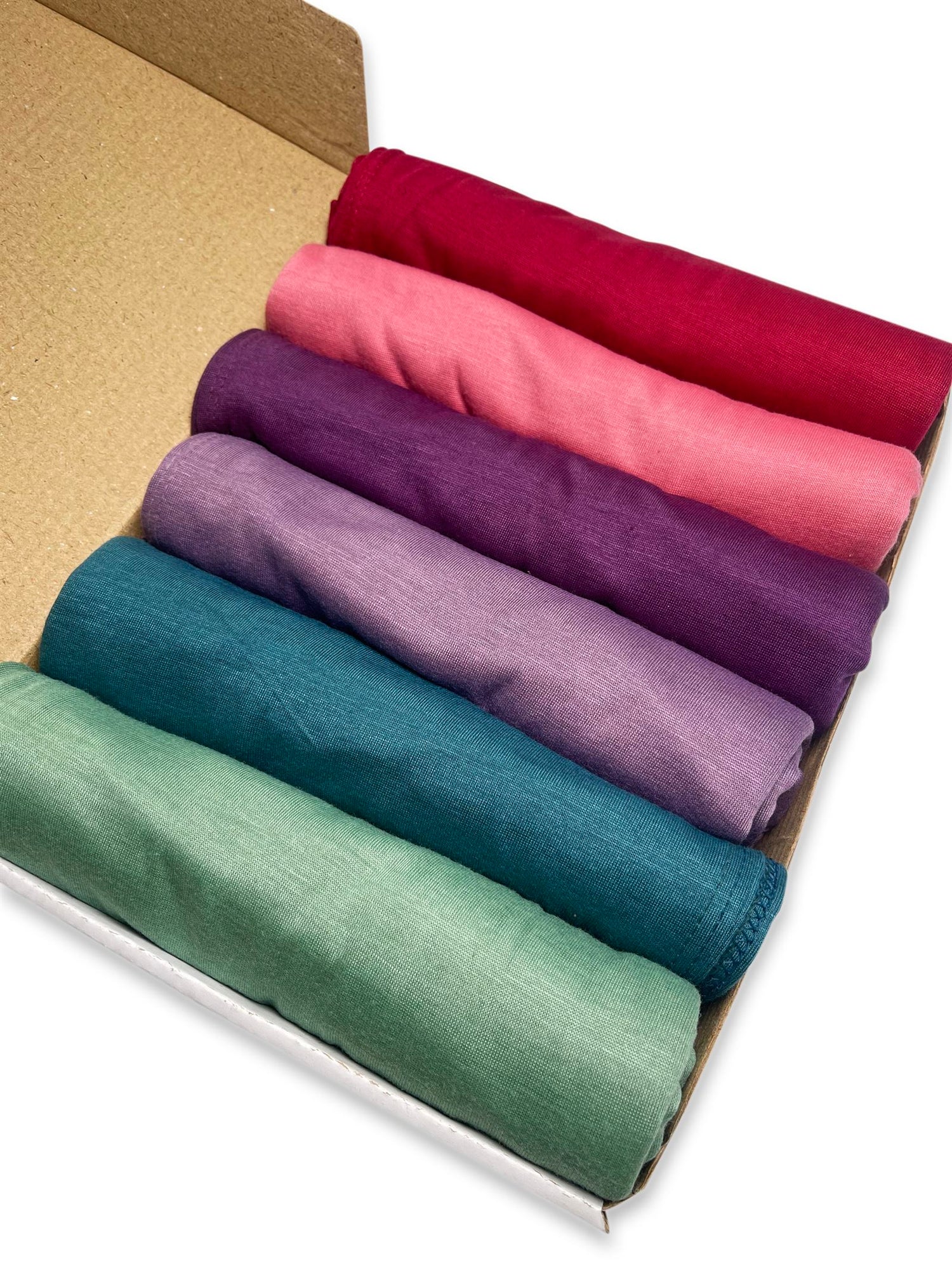 A Pack of 6 Jersey Hijabs. Curated each Scarf in a Box gift. Offer 6 elegant Crimson charm hues. jersey scarves Gift set.