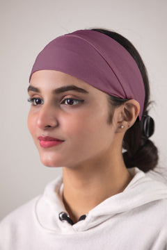 Girl Wearing No Slip Hijab Head Band in Mauve Color. Side pose.