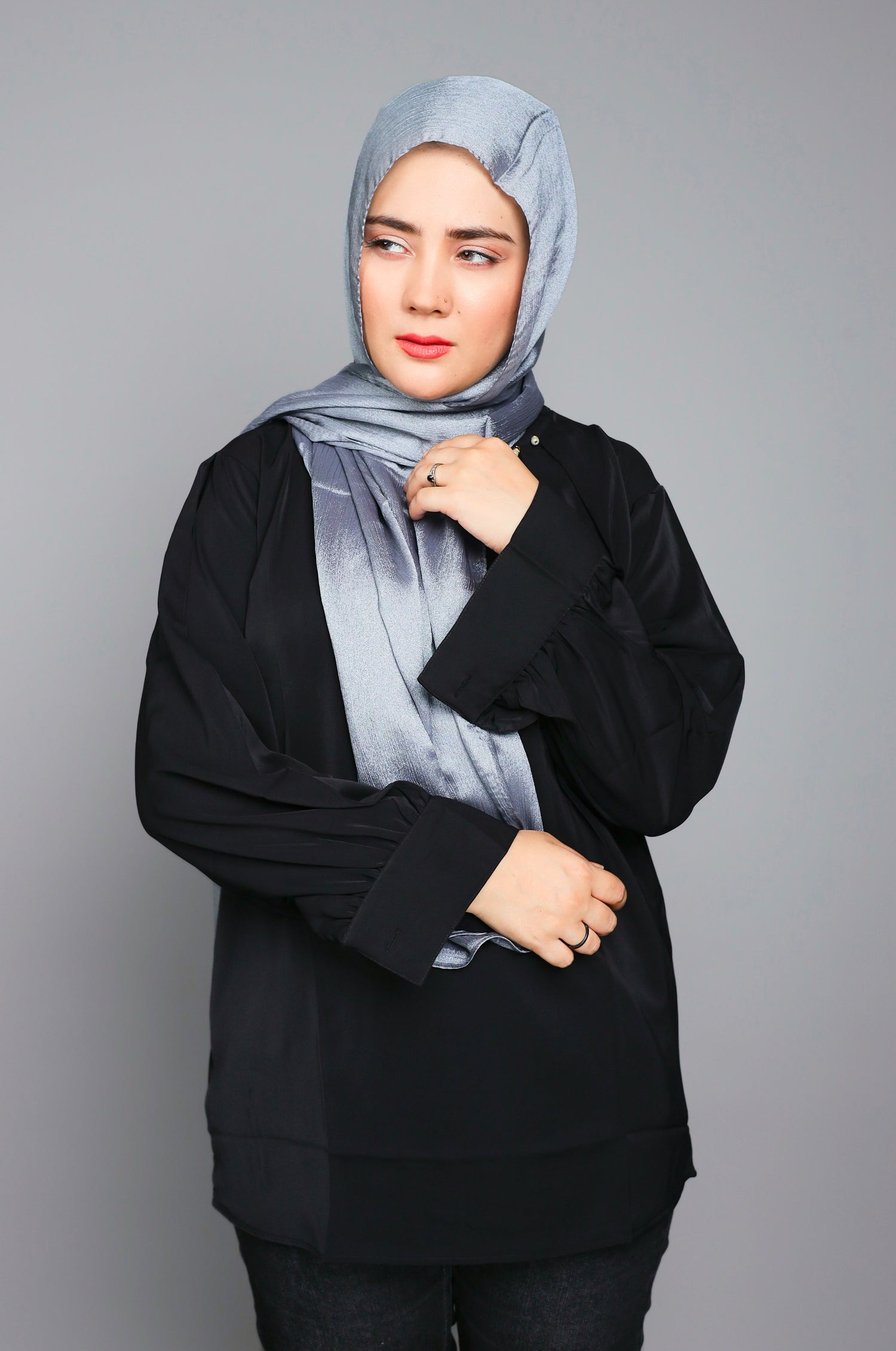 Metallic Chiffon Hijab, adding a subtle glow and style. Elegant Silver shade.