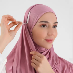 Model wearing a hijab secured with Double Sided Tape, showcasing its invisible support and polished appearance.