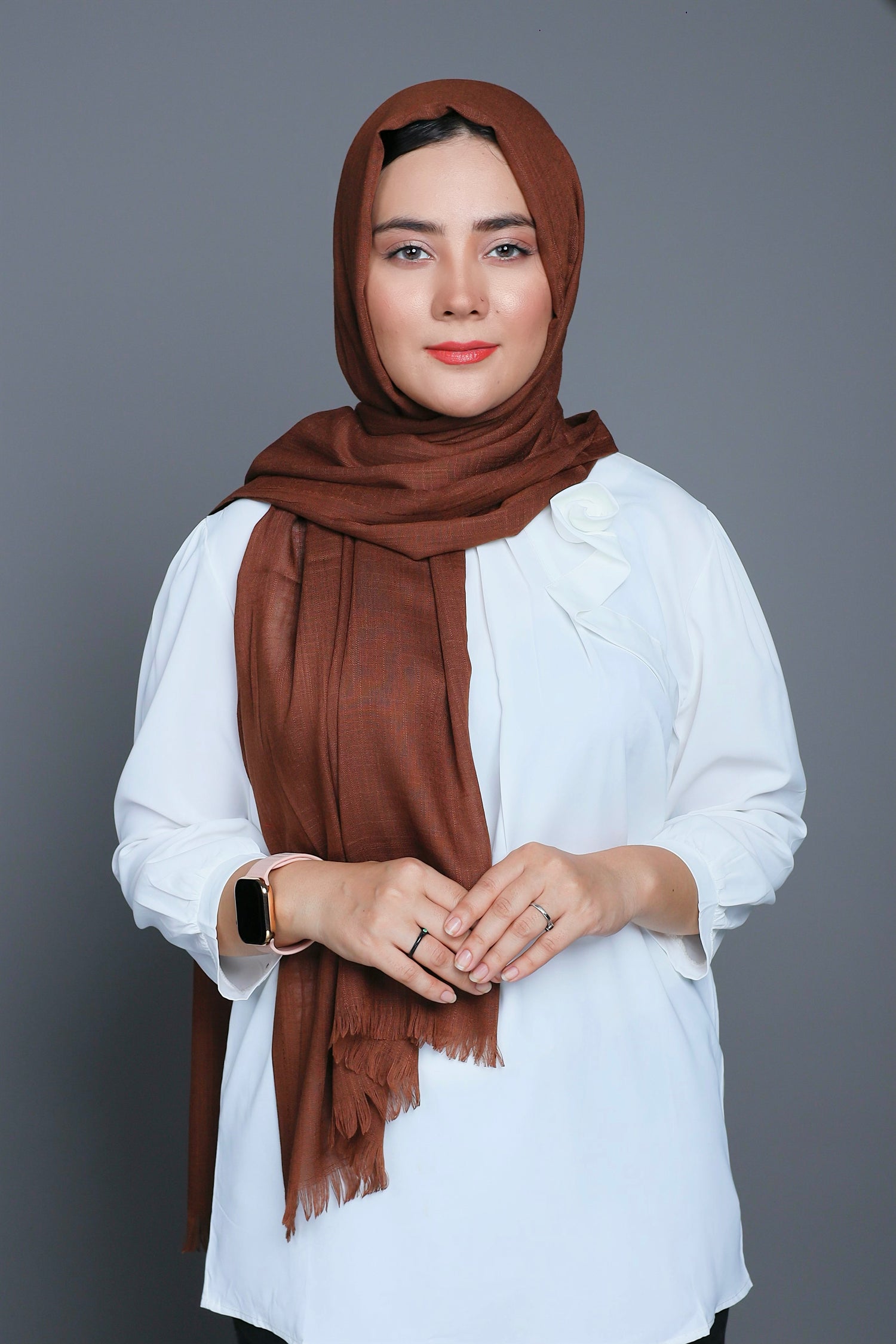 Close-up of the Coffee Cotton Viscose Hijab, emphasizing its luxurious feel and warm color.