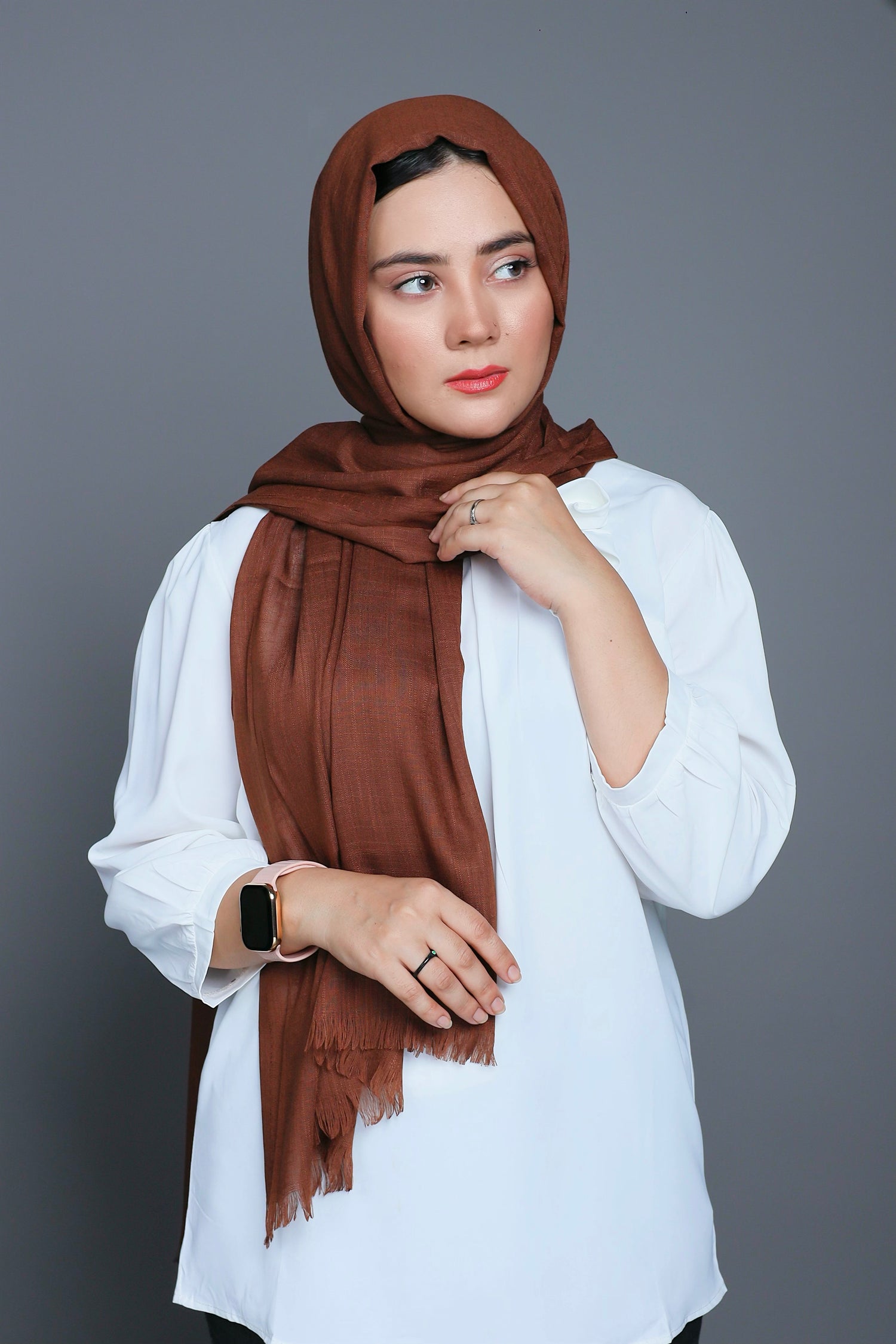 Turkish Viscose Hijab in Coffee shade, highlighting its soft texture and elegant design. Coffee Color Hijab.