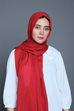 Woman styling a Maroon Viscose Hijab, capturing its chic look and lightweight feel. Turkish Hijab in Maroon.