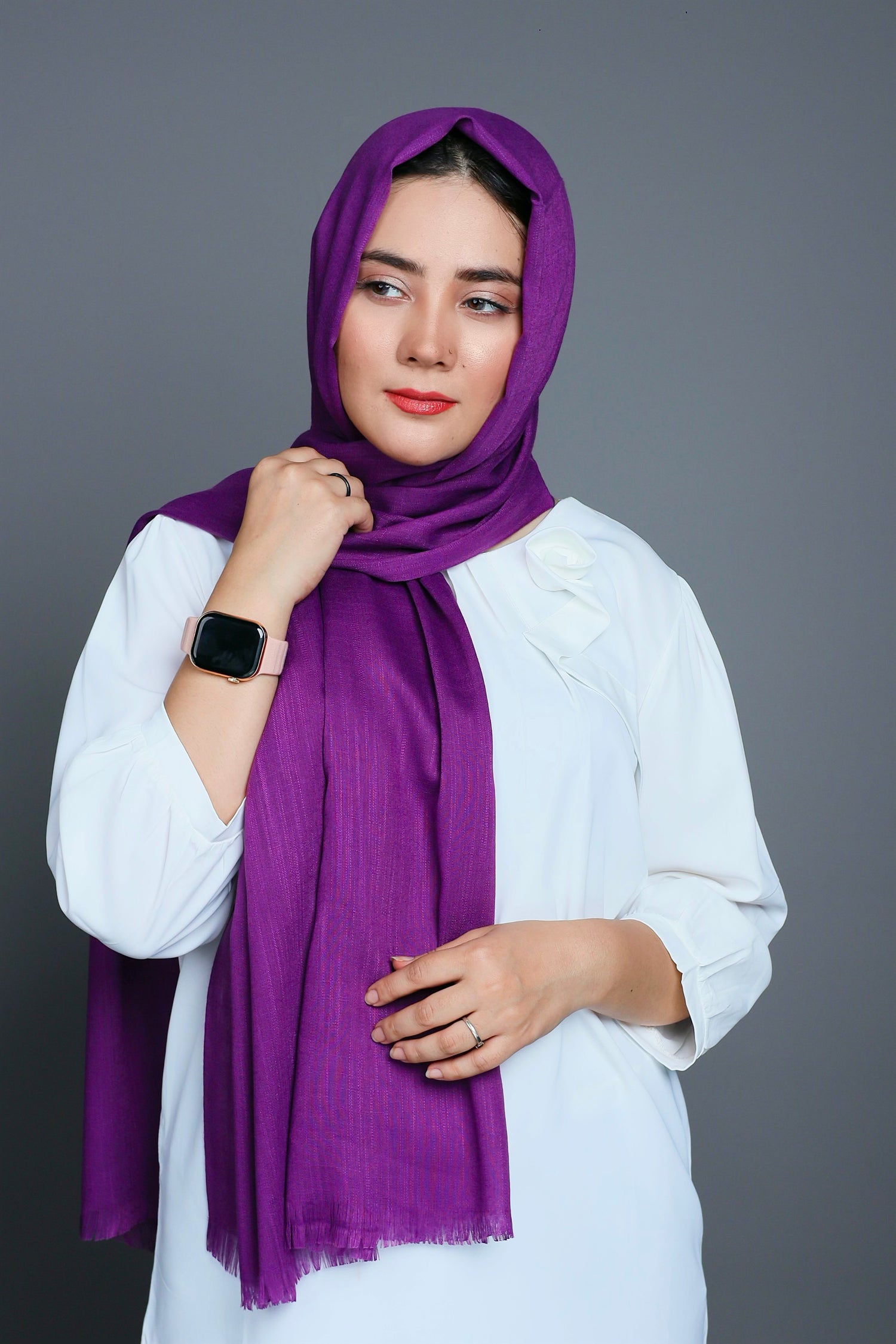 A stylish girl draped in a Royal Purple hijab, highlighting the softness and comfort of the fabric.