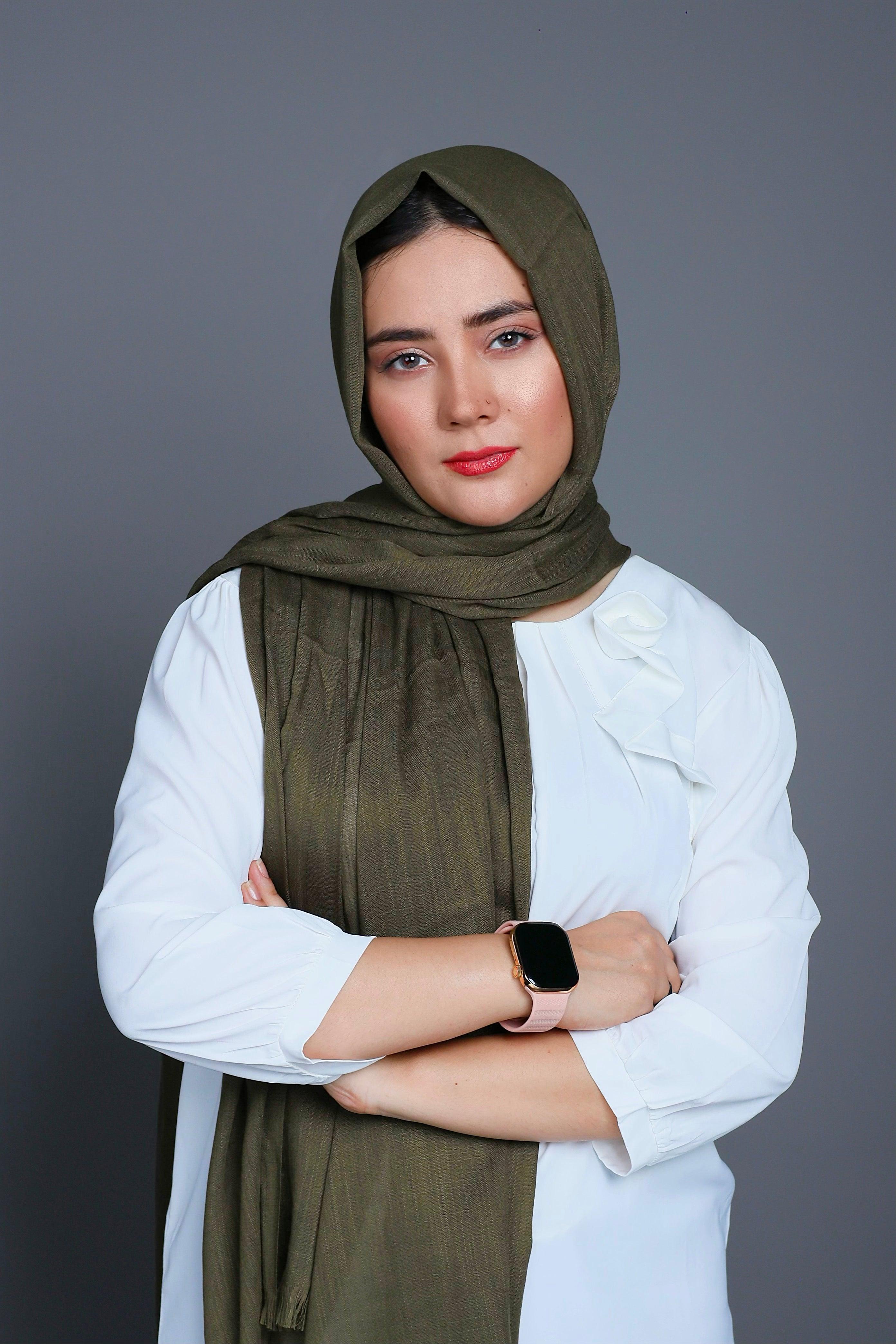 Turkish Hijab in a soothing Olive Green shade, showcasing its soft fabric and elegant design. Turkish Cotton Viscose