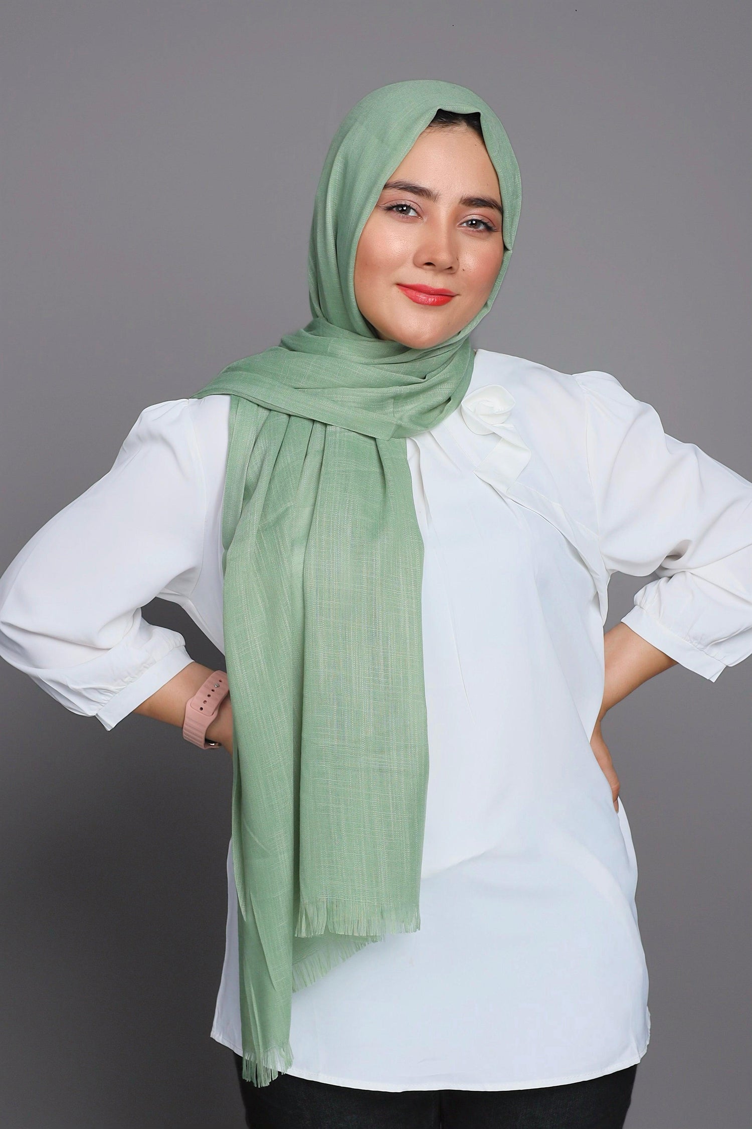 Turkish Scarf Hijab in Apple green. soft Viscose, showcasing its smooth texture.