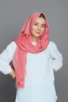 Woman wearing a Mystic Rose Hijab, demonstrating its non-slip design for all-day comfort.