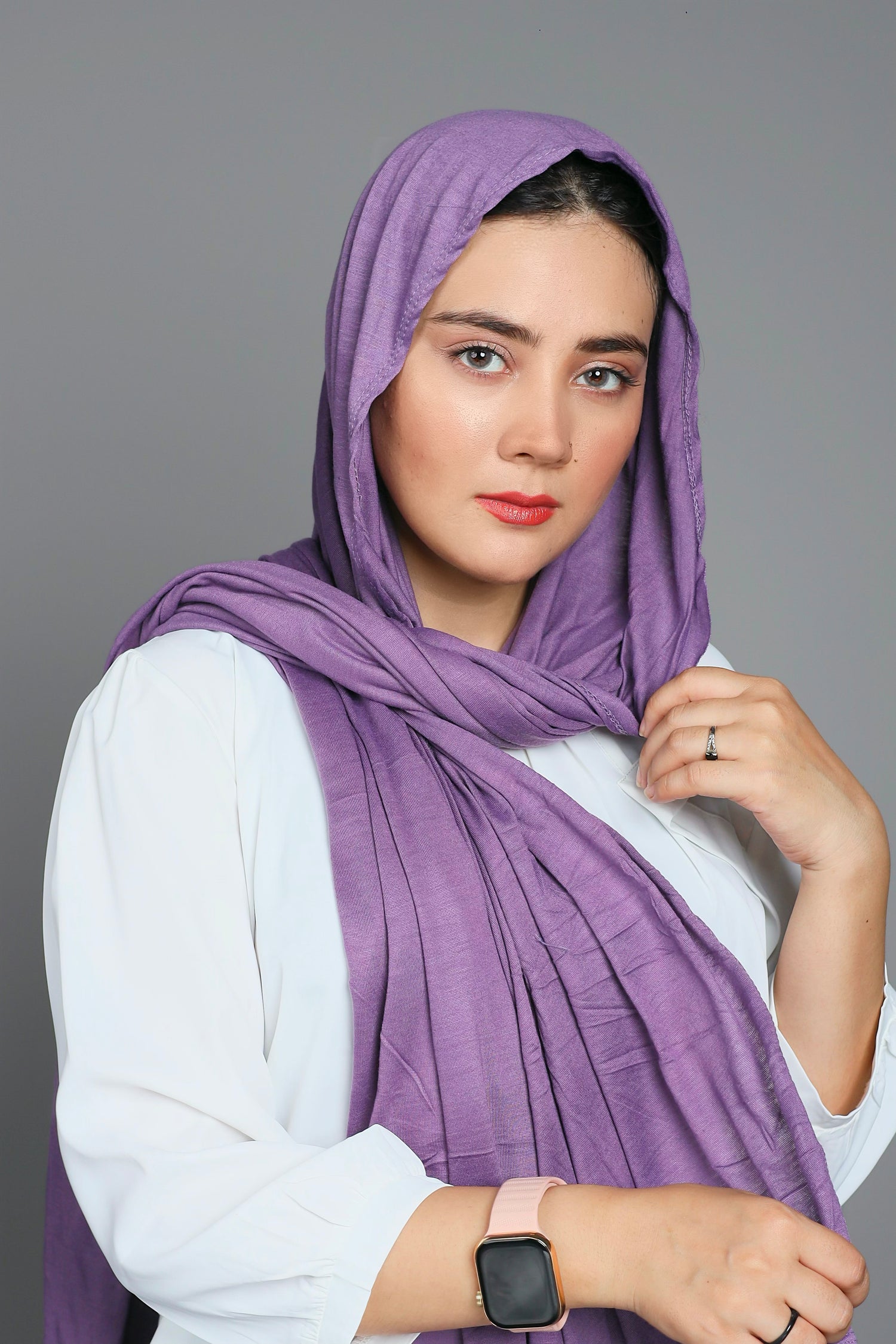 Girl wearing Jersey Hijab in purple color. Made from high quality Jersey.