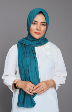 Girl wearing Stylish & Cozy blue Jersey Hijab. Made from Premium jersey fabric.