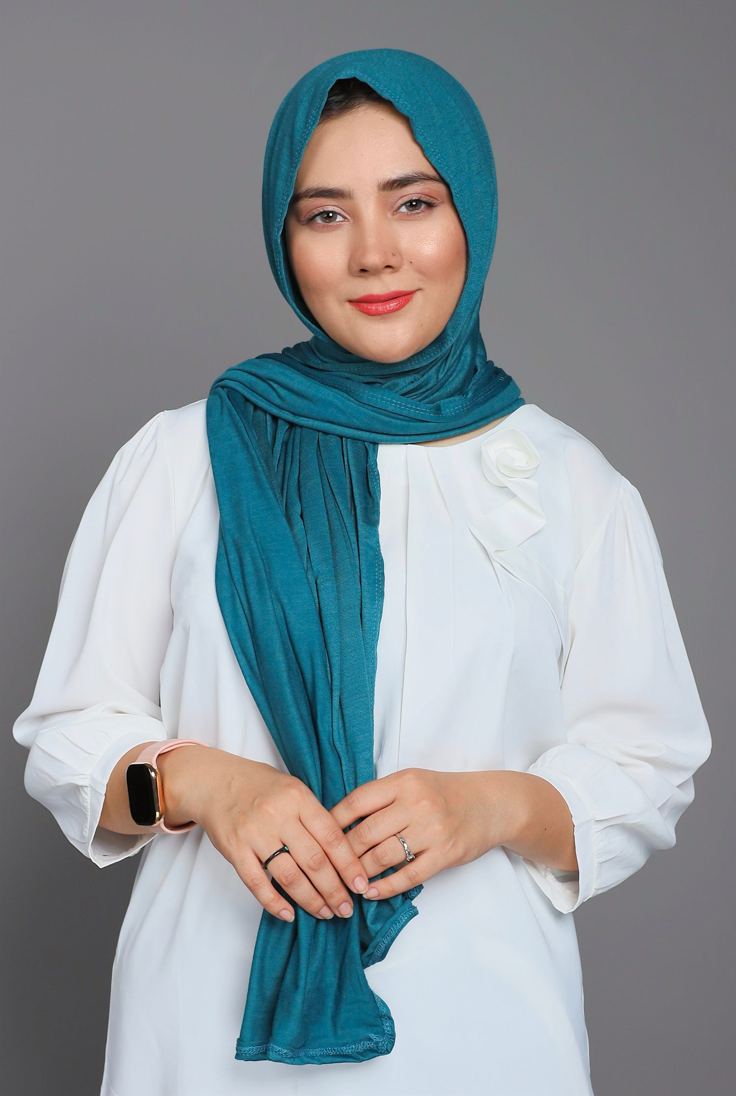 woman wearing Blue Jersey Hijab. Offer Versatility and Comfort.