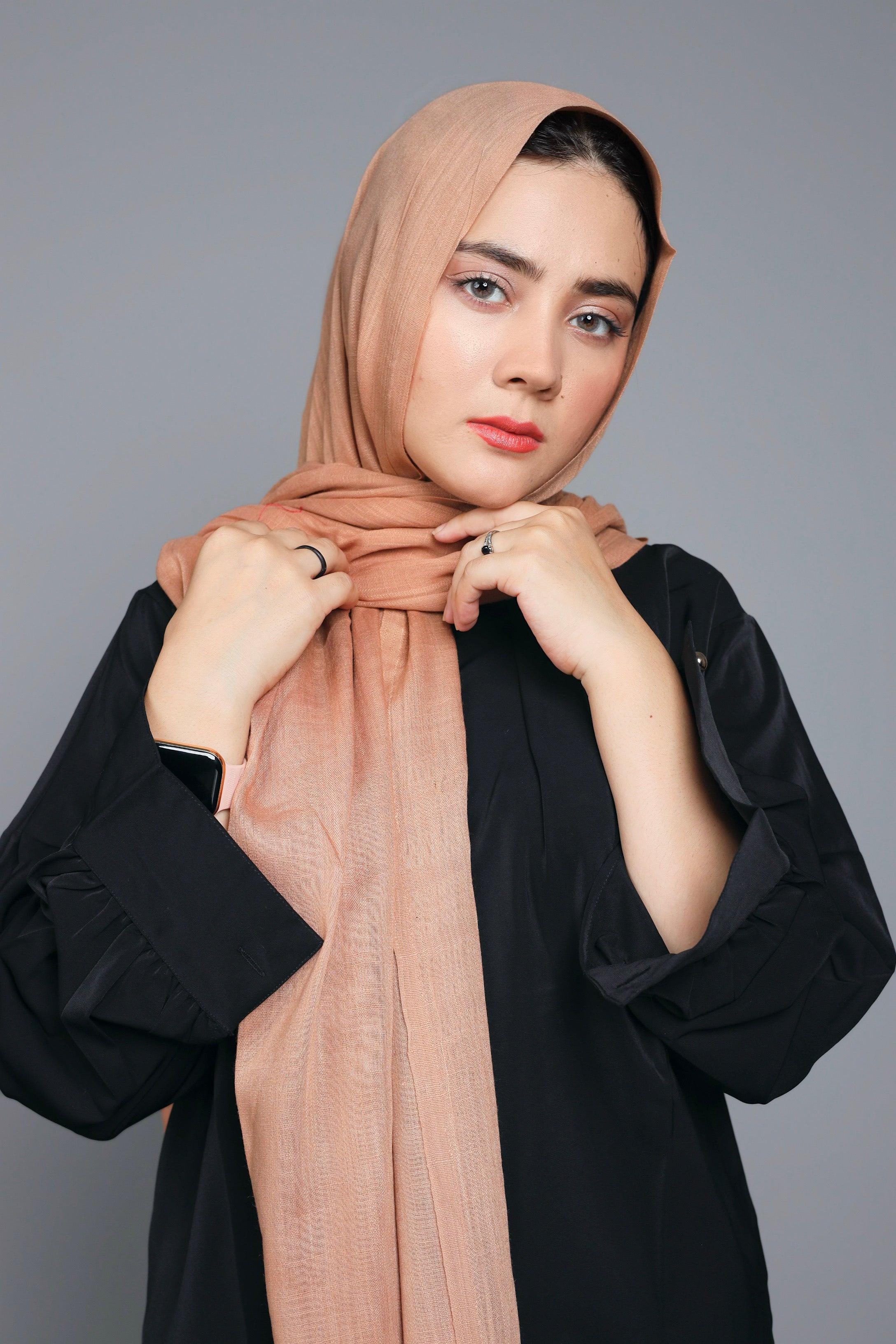 Turkish Scarf Hijab in Hazelnut, folded neatly to display its light to medium thickness.