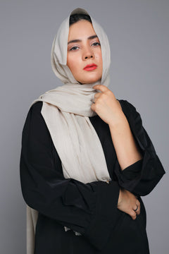 Girl wearing Turkish Hijab, viscose fabric, honey glaze, looking straight.