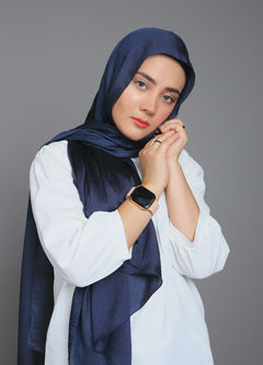 Modern Hijabi wearing Metallic Chiffon Hijab in Elegant Blue Moon shade.