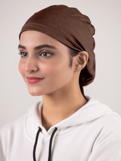 GIrl wearing Dark Brown Ruched Hijab Cap featuring ruched detailing.