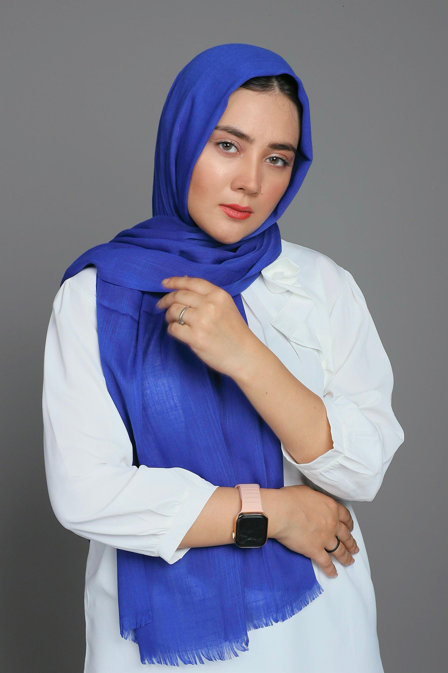 Girl showcasing a chic Ink Blue hijab, blending comfort and fashion beautifully. Turkish Hijab. Made from Luxurious cotton viscose material.