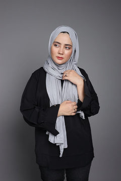 Woman wearing Jersey Hijab Light Grey color.