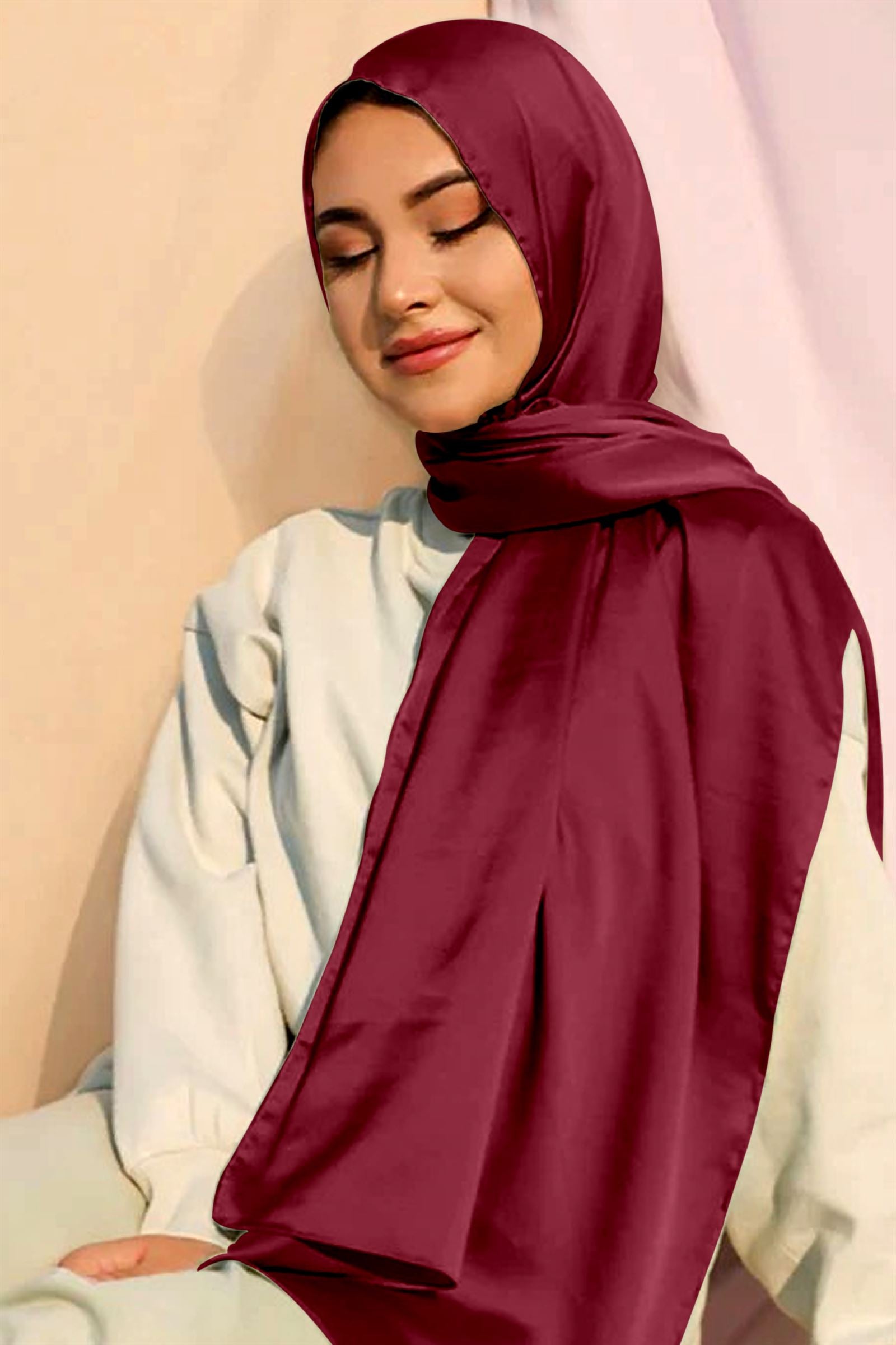 Elegant woman draping in Satin Silk Hijab in Maroon Color.