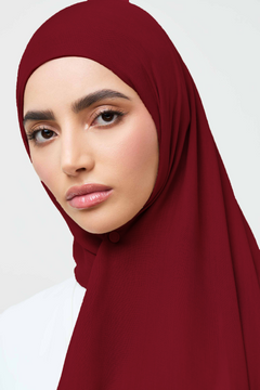 Girl wearing modal fabric hijab in maroon. Shop Online at hijabandco Pakistan