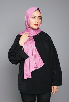 Girl in Dark Mauve Jersey Hijab looking her right, perfect for casual and special events.