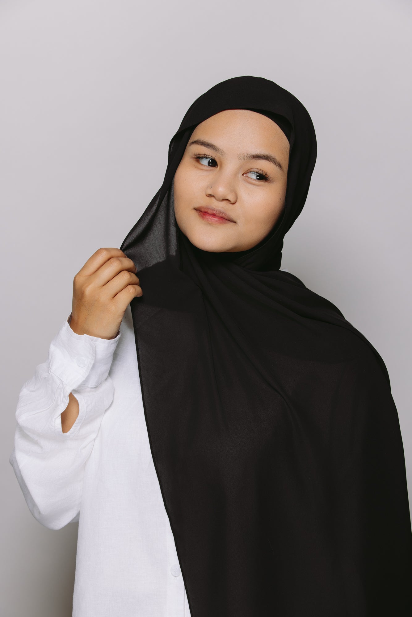 a girl wearing a Georgette instant hijab with a jersey ninja cap. 
