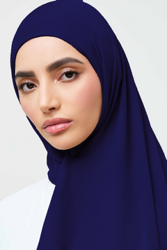 Girl wearing modal hijab in navy blue, shop online at Hijabadco Pakistan.