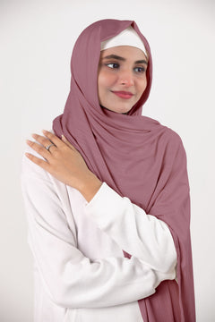 Ribbed jersey hijab. Adds luxury to wardrobe. Girl wrapped in premium Hijab made of ribbed jersey fabric.