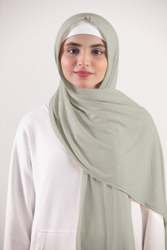 Ribbed Jersey Hijab in Pearl White Woman wearing a chic Hijab crafted from Ribbed jersey.