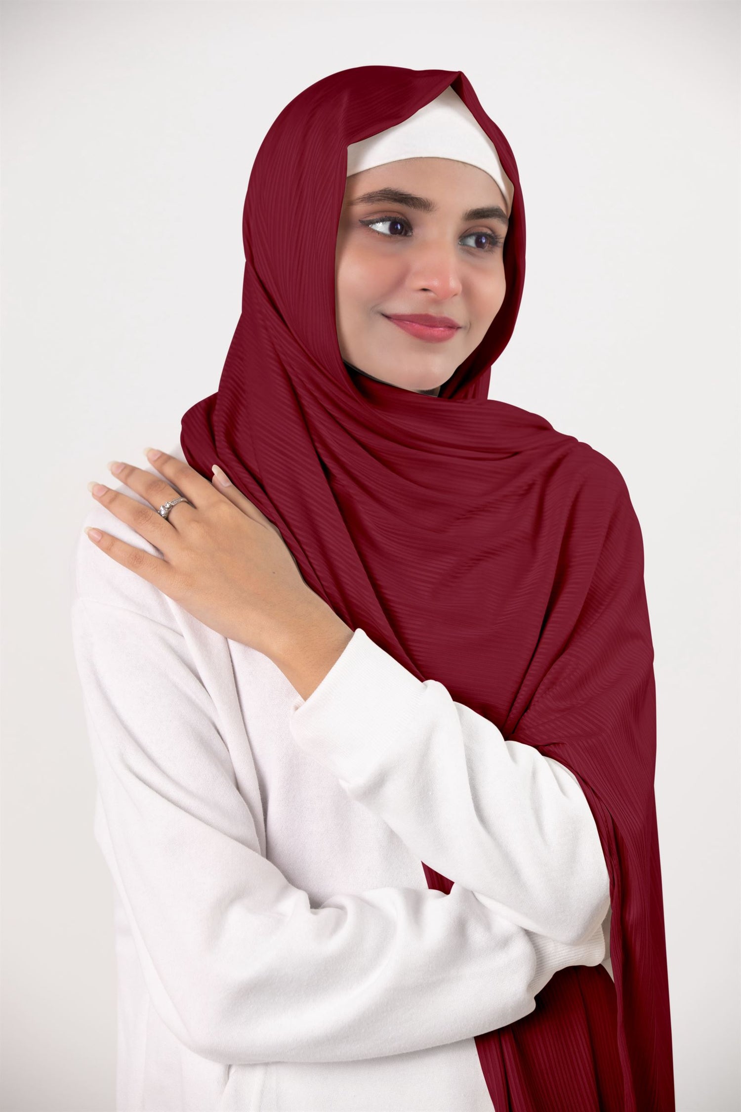 Ribbed Jersey Hijab in Scarlet draping beautifully on a modern hijabi.