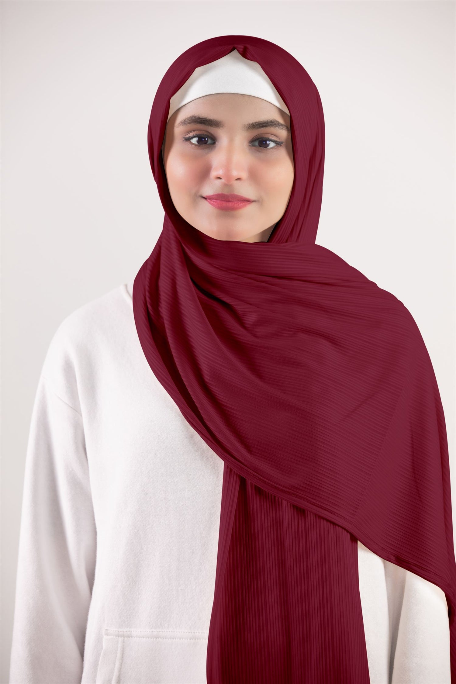 Ribbed Jersey Hijab in Scarlet Woman wearing elegant hijab made of Premium ribbed jersey for a striking look.