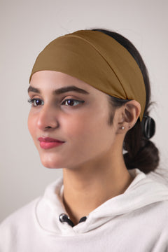 Girl Wearing Hijab Band in Brown Color. Side Pose.