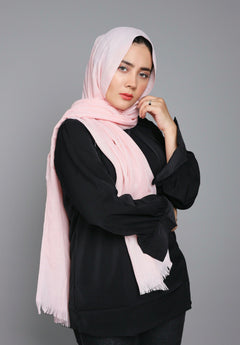 Turkish Viscose Hijab in Pastel Pink, showcasing its soft texture and elegant color. Pink Turkish Hijab