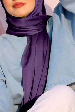 Girl wearing Seamless Satin Silk Hijab in Dark Purple.