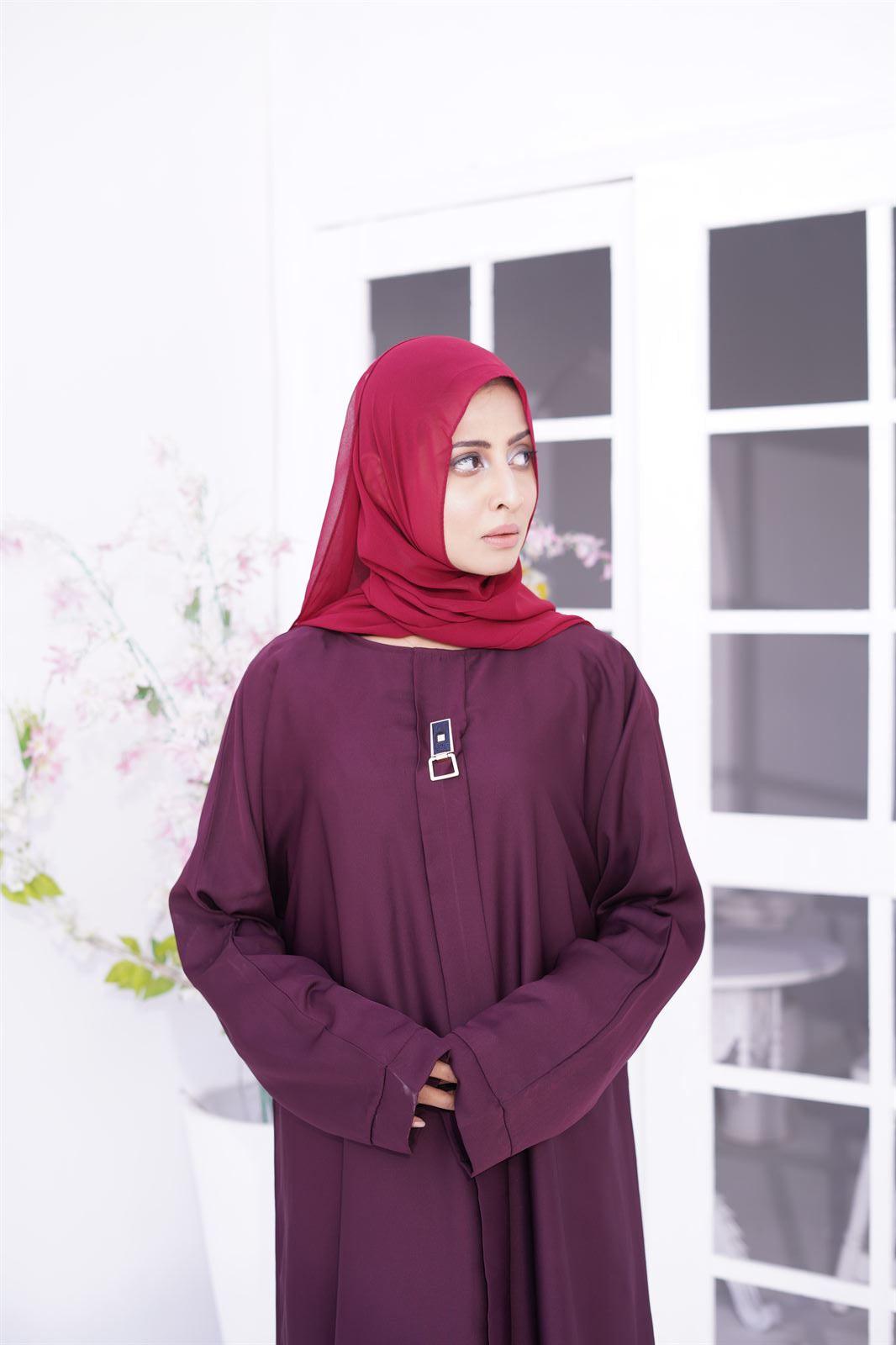 Amirah Abaya Online Shopping in Pakistan. Girl Wearing mauve Burqa made from premium nida fabric.