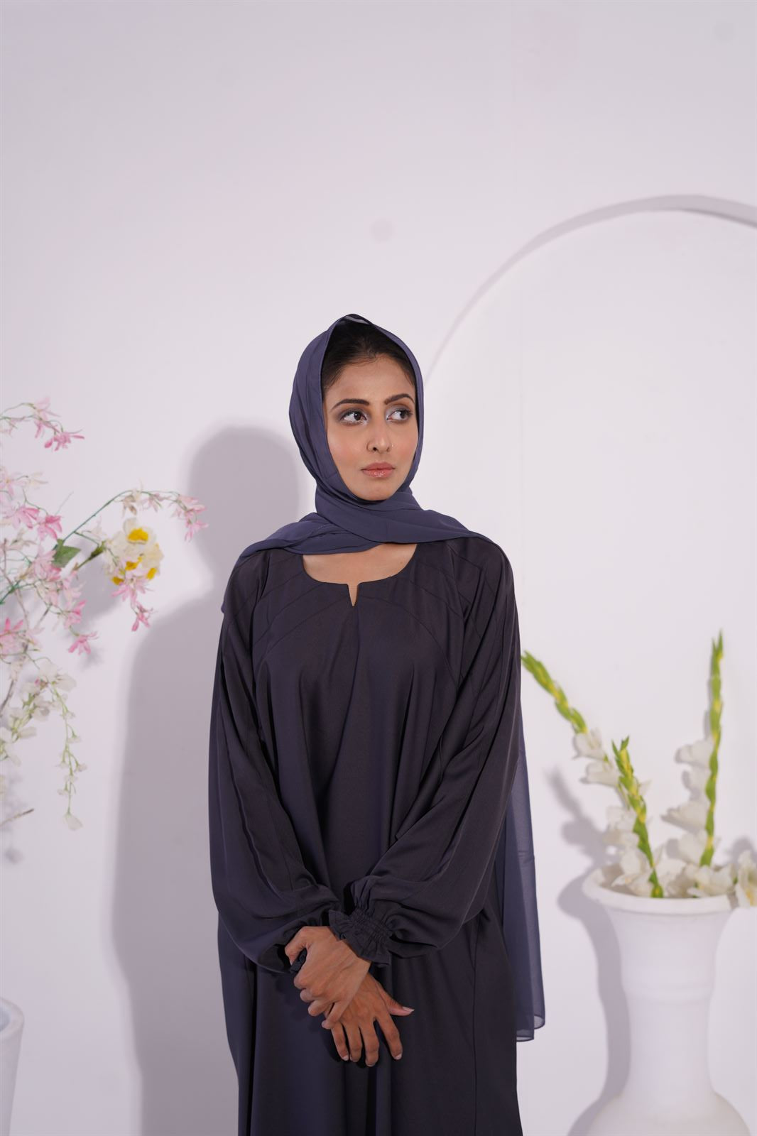 girl wearing charcoal grey paintex kaftan maxi abaya.